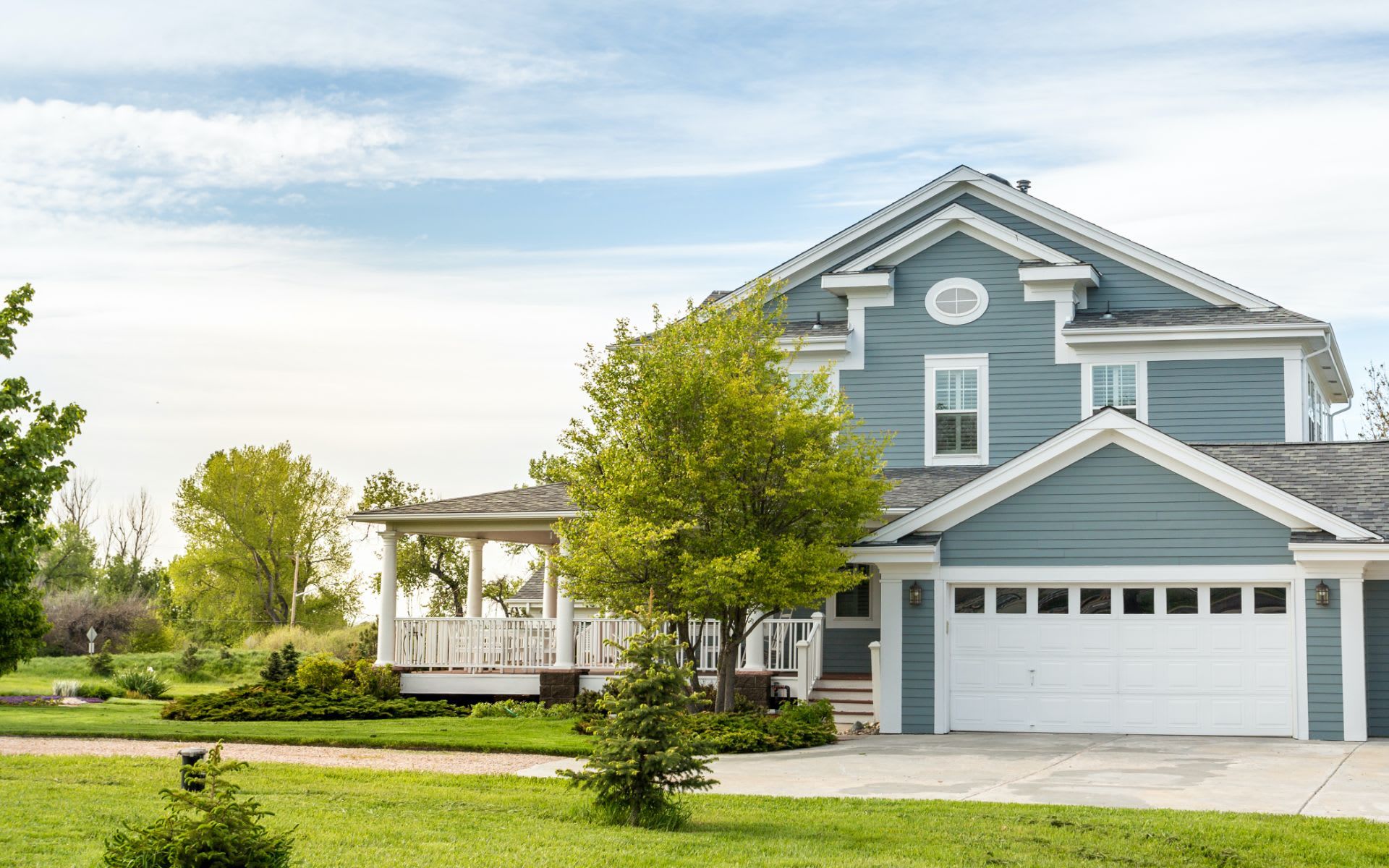A Shore colonial with a wraparound porch